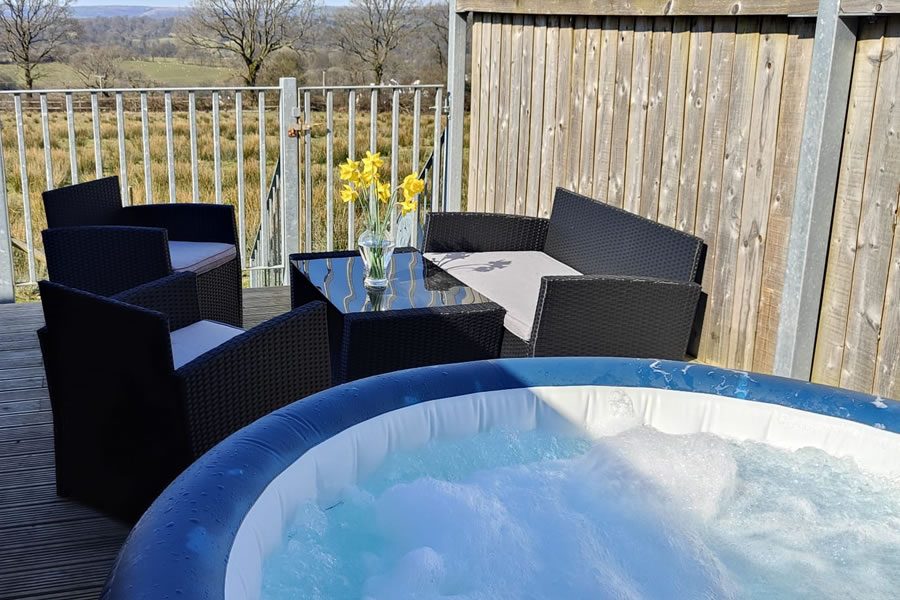 Relax in your private hot tub at The Country Retreat Wales